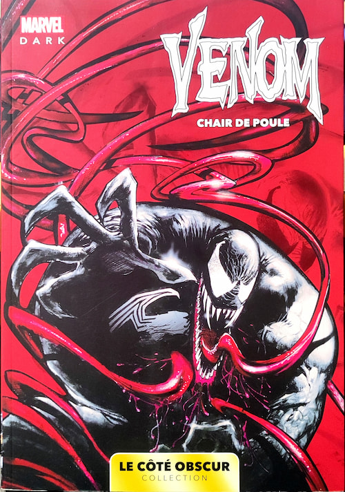 Couverture de comic-book. On y voit un humanoïde extra-terrestre noir avec une araignée blanche sur la poitrine tandis que sa langue semble s'étirer à l'infini. Les titre est : Venom, Chair de Poule.