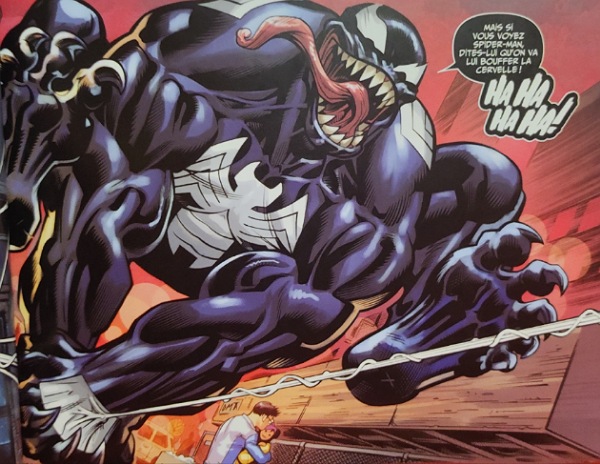 Image de Comic-Book où l'on voit Venom s'élancer avec une toile tandis qu'il dit qu'il va bouffer la cervelle de Spider-Man.