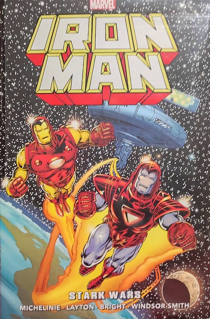 Couverture du comic-book Iron Man : Stark Wars. On y voit deux armures d'Iron Man, l'une rouge et pr, la seconde rouge et argent. Ils volent en direction du spectateur, ils sont dans l'espace au-dessus de la planète terre. En grand et stylisé, le logo Iron Man est inscrit en blanc.